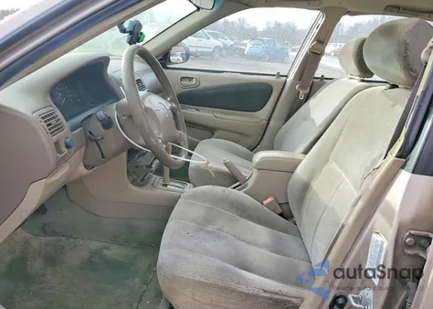 2001 Toyota Corolla Ce z USA, uszkodzony, nr VIN 1NXBR12EX1Z478817